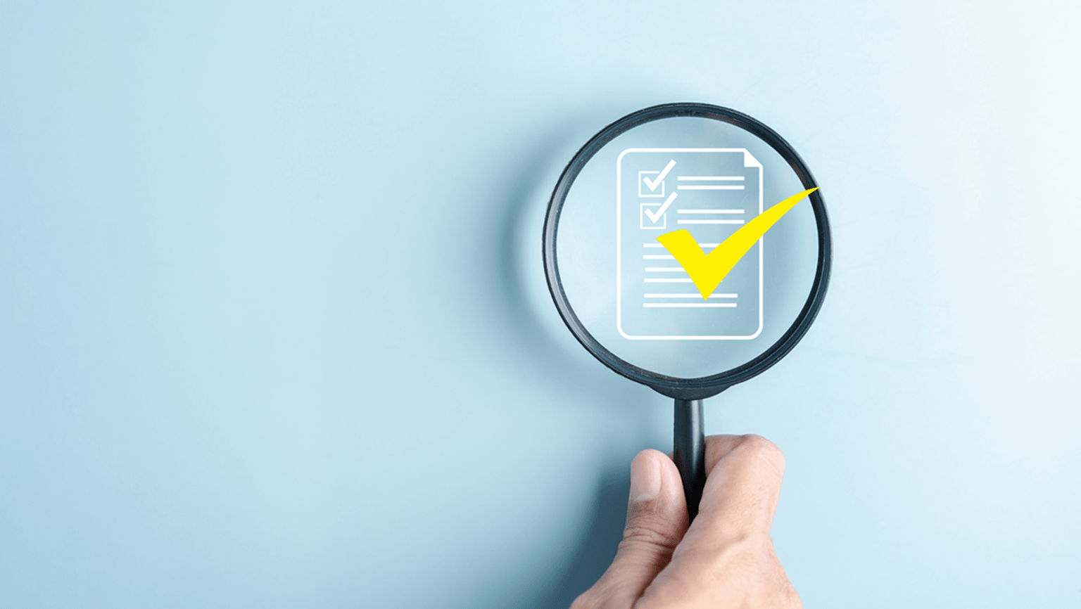 Magnifying glass looking over a stylised checklist icon.